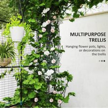 Load image into Gallery viewer, Green trellis with climbing plants and flowers against a white wall.