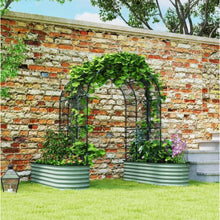 Load image into Gallery viewer, Garden arch with plants against a brick wall
