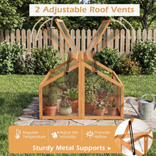 Load image into Gallery viewer, Wooden greenhouse with adjustable roof vents and potted plants in a garden setting.